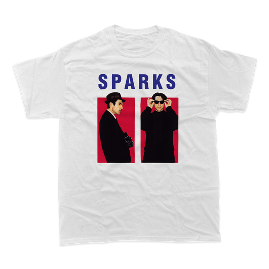 White t-shirt featuring two figures and the text ’SPARKS’ above them.